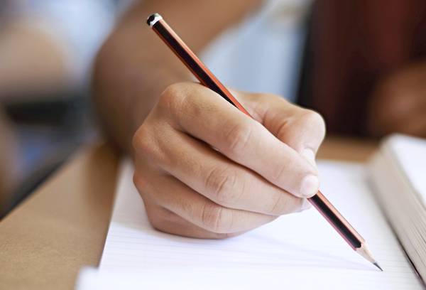 hand holding a pencil